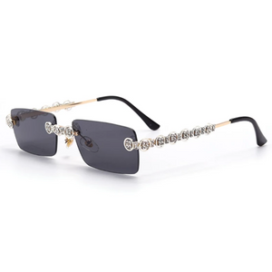 gold and silver jeweled sunglasses with black lens