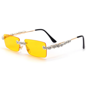 gold and silver jeweled sunglasses with gold lens