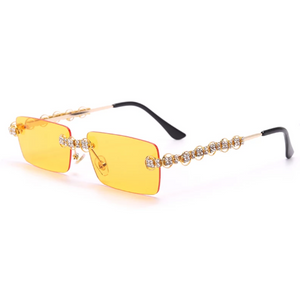 gold jeweled sunglasses with gold lens