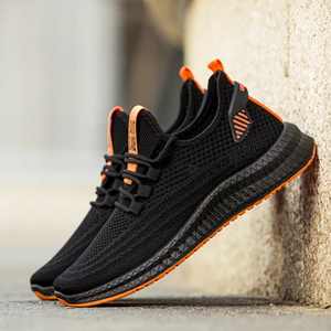 men's low cut walking sneaker black orange trim